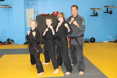 Karate students earn black belt honors