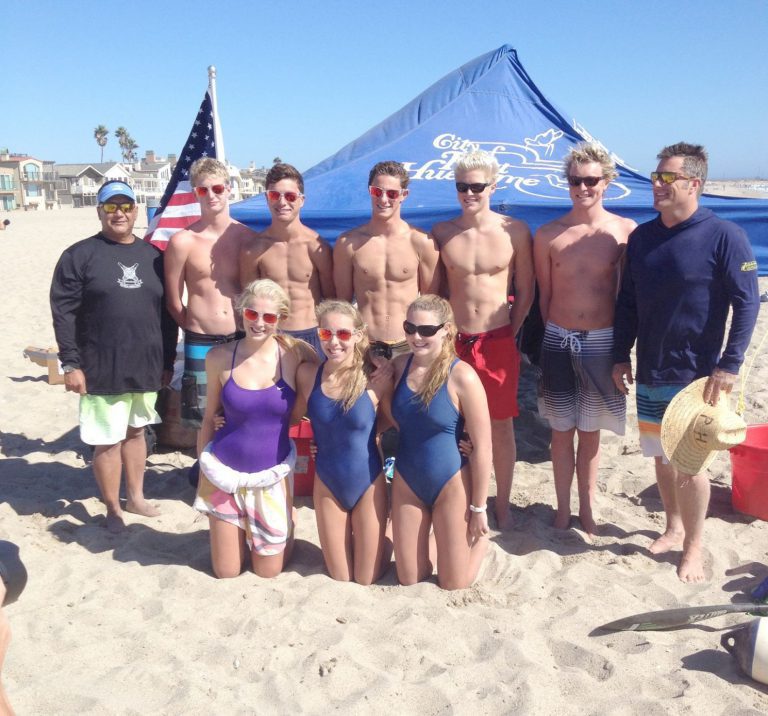 Lifesaving Team Practices At Local Beach For French Competition