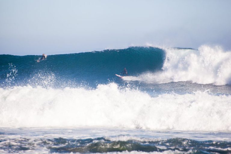 Surfers Catch Some Waves At Big Dume