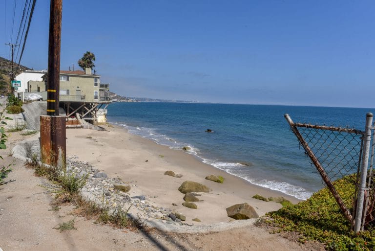 Malibu Couple Sues City Over Private Beach Signs