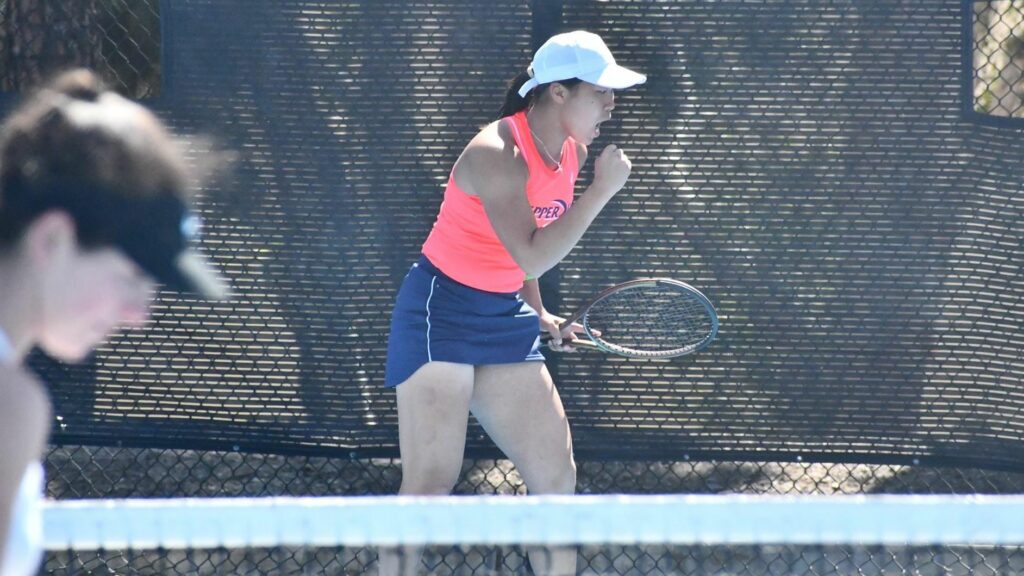 Waves womens tennis player Janice Tjen competing against Princeton. Photo by Brock Reisler.
