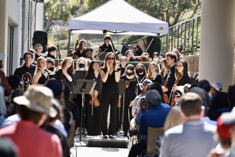 MHS Orchestra performs outside City Hall