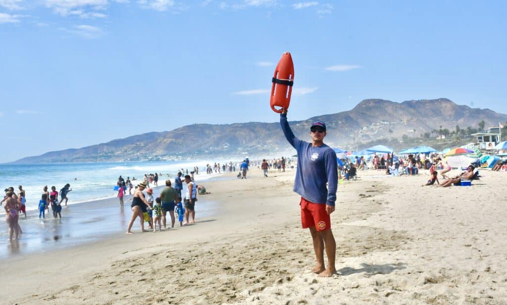 ZUMA BEACH, CALIFORNIA, USA - People on Zuma beach, public beach