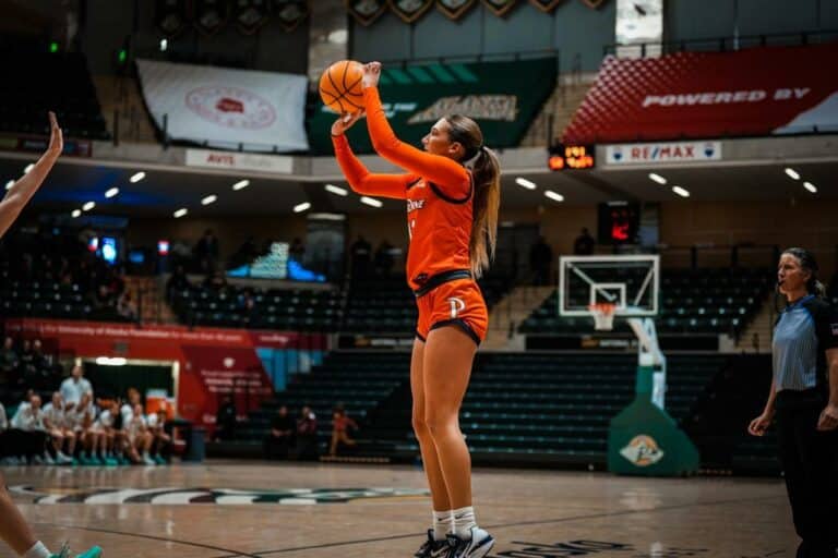 Waves basketball teams win games on the same day