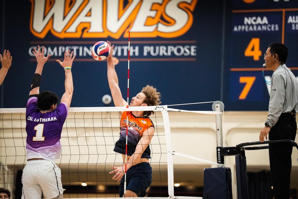 Waves Jacob Steele goes for a kill against Cal Lutheran Photo by Morgan Davenport