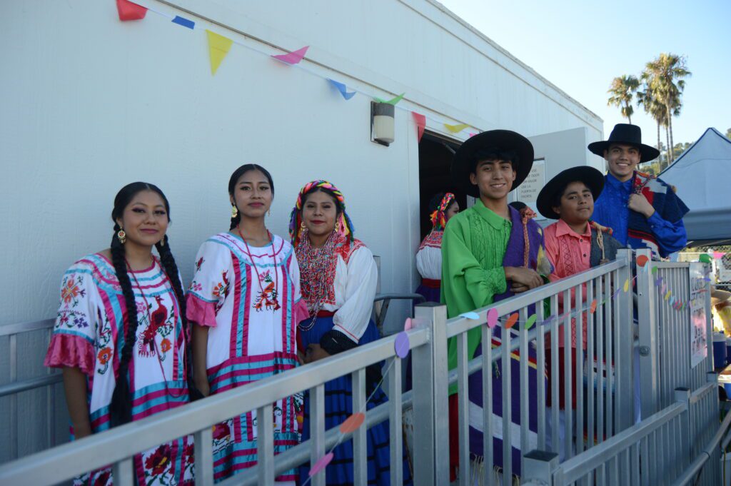 Members of the Grupo Folklorico pose for a photo before beginning their traditional Oaxacan dance performance. Photo by Emmanuel Luissi