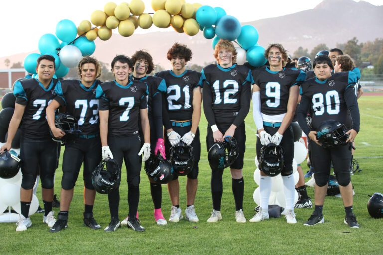 Sharks football runs and passes for blowout win on Senior Night