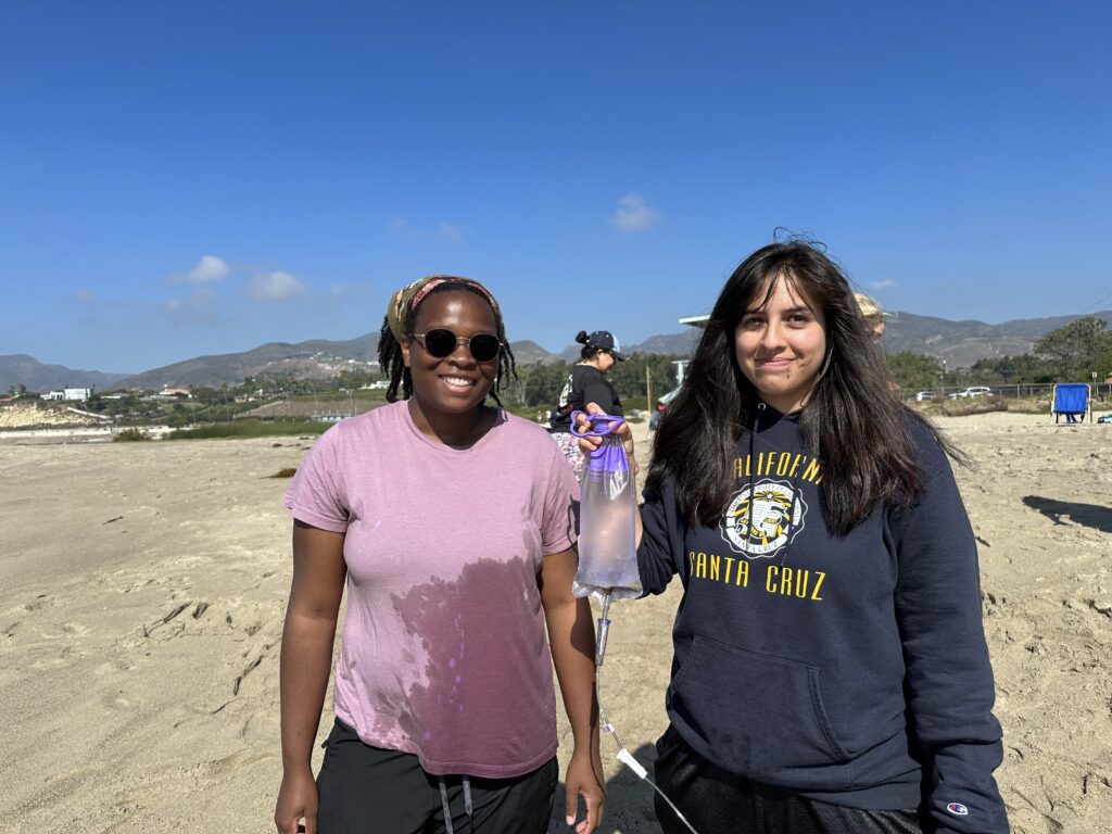 3 Moriah Byrd and Ashley Barba show off a successful water sample at the eDNA event on Oct 28