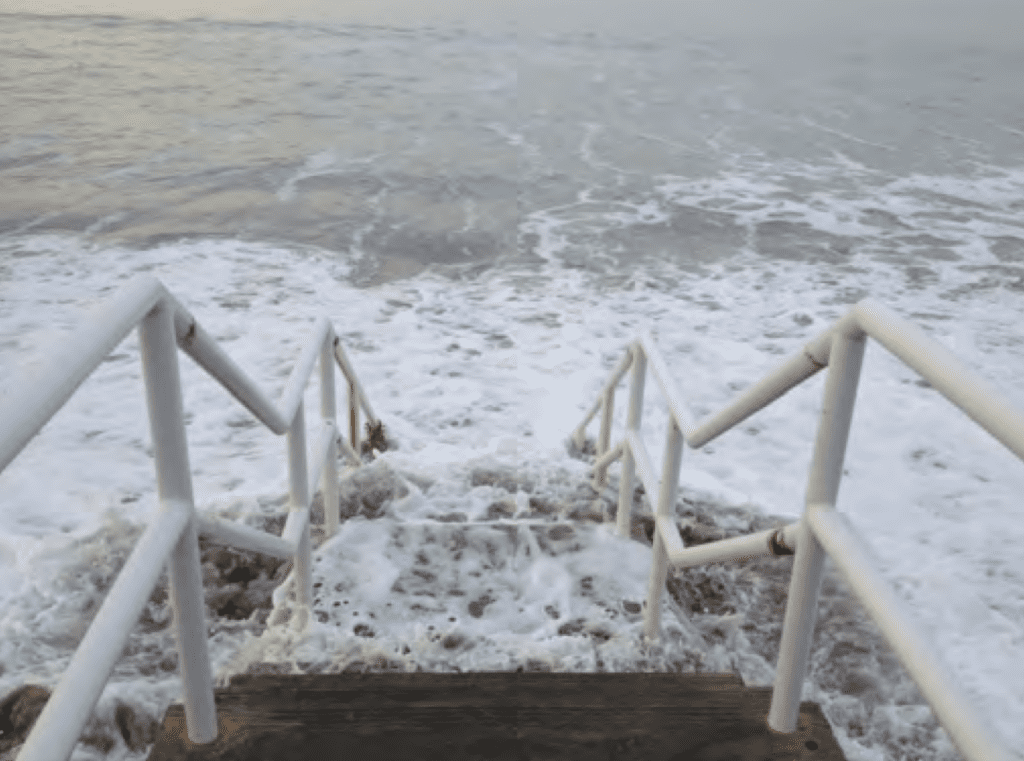 King tide conditions at Broad Beach along the revetment left and at a beach access point right on January 22 2016