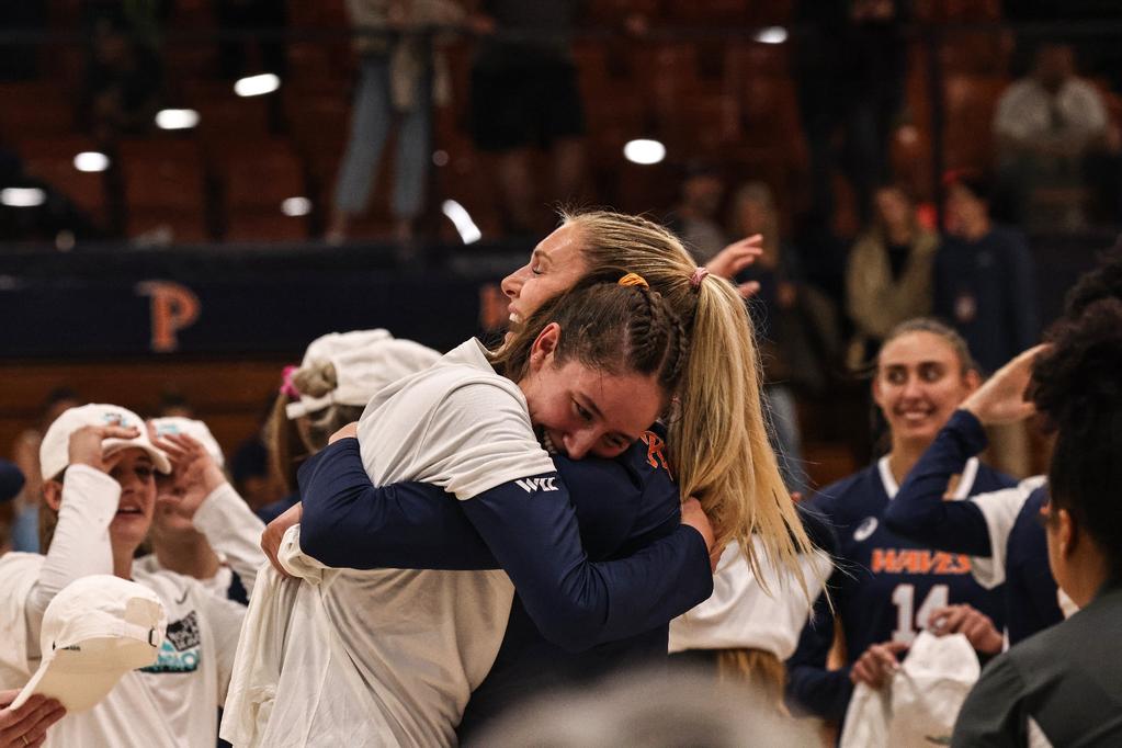Waves Grace Chillingwoth and Birdie Hendrickson celebrate winning the WCC crown. Photo from Pepperdine Athletics