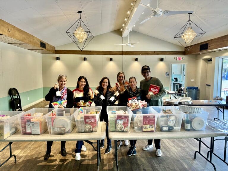 OLM Parents assemble Thanksgiving baskets