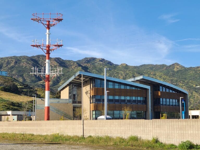 Residents rally against antenna tower at SMC Campus