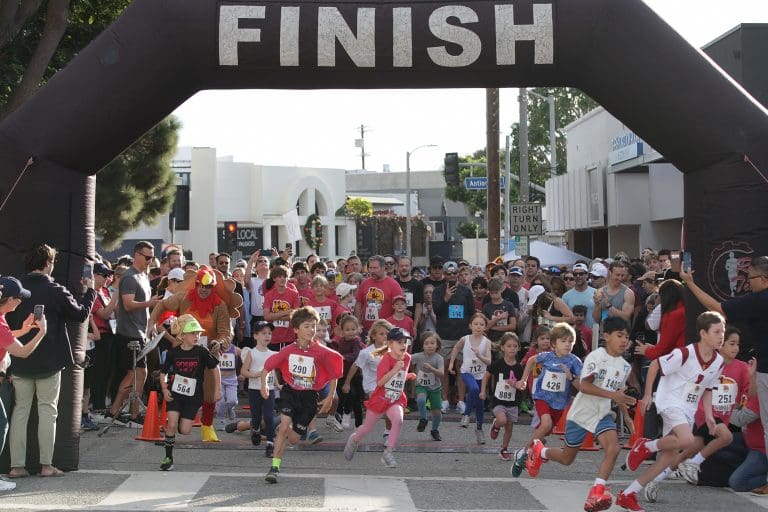 Amid ashes and rubble, Pacific Palisades runs again